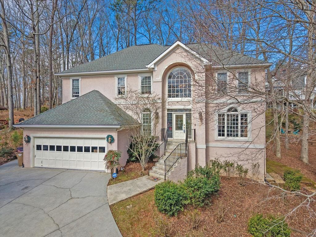 5 bedroom, 4 bathroom, 3,450 sq ft single family residence for sale at 1420 Olde Forge Lane, Woodstock, GA 30189