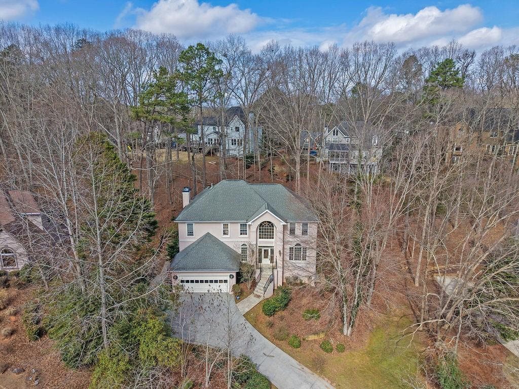 5 bedroom, 4 bathroom, 3,450 sq ft single family residence for sale at 1420 Olde Forge Lane, Woodstock, GA 30189 — photo 2