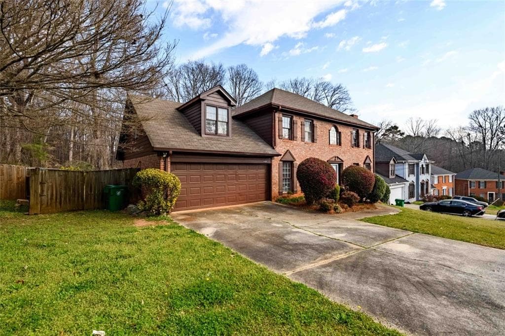 4 bedroom, 3 bathroom, 2,805 sq ft single family residence for sale at 6420 Phillips Place, Lithonia, GA 30058 — photo 2
