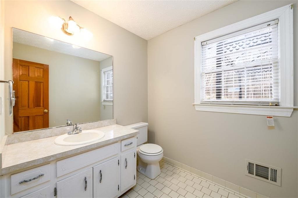 4 bedroom, 3 bathroom, 2,805 sq ft single family residence for sale at 6420 Phillips Place, Lithonia, GA 30058 — photo 6