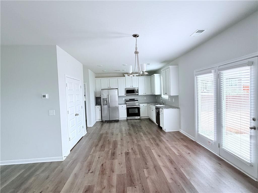 4 bedroom, 3 bathroom single family residence for rent at 409 Mcginnis Circle, Calhoun, GA 30701 for $2,000 a month — photo 4