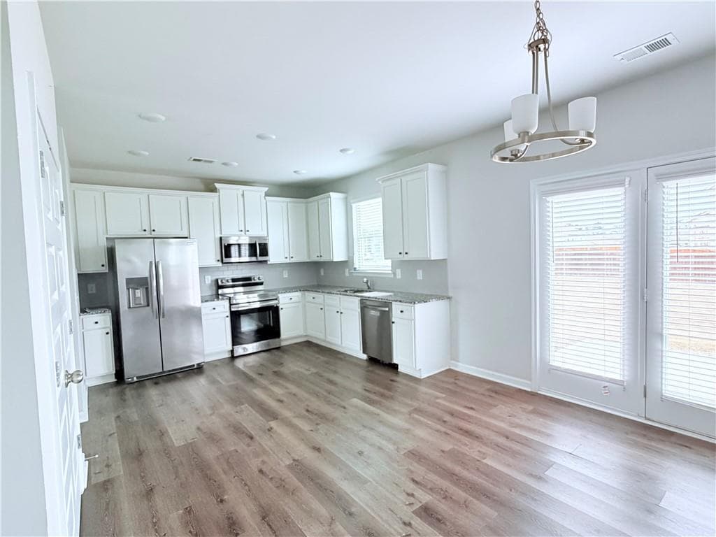 4 bedroom, 3 bathroom single family residence for rent at 409 Mcginnis Circle, Calhoun, GA 30701 for $2,000 a month — photo 6