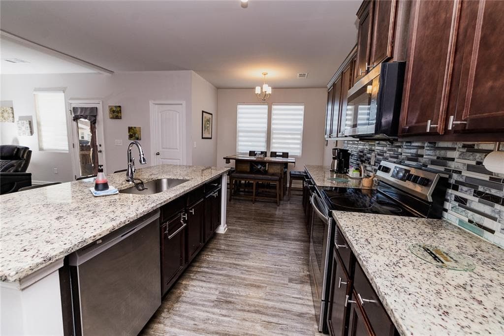 4 bedroom, 3 bathroom, 2,088 sq ft single family residence for sale at 4963 Hillstone Drive, Gainesville, GA 30504 — photo 7