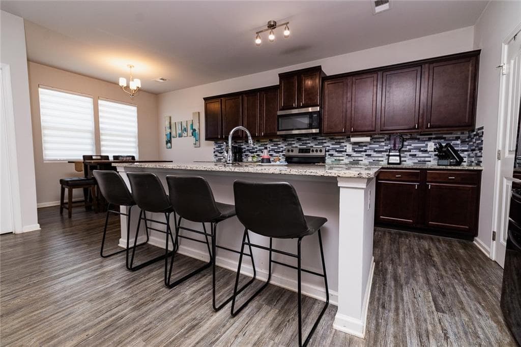 4 bedroom, 3 bathroom, 2,088 sq ft single family residence for sale at 4963 Hillstone Drive, Gainesville, GA 30504 — photo 8