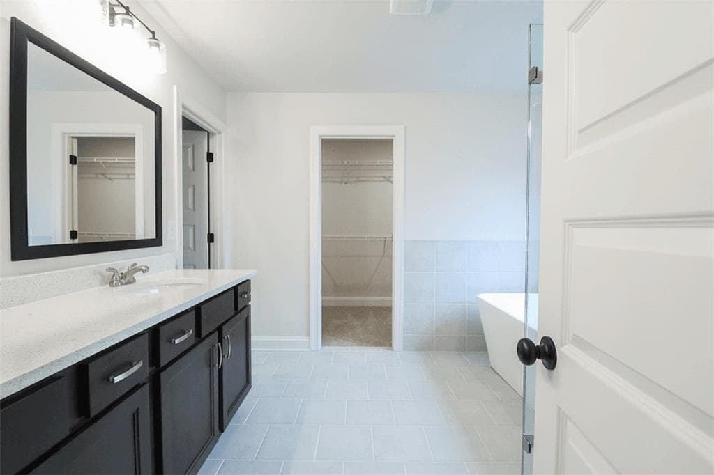 4 bedroom, 3 bathroom, 2,660 sq ft single family residence for sale at 1238 Cherry Bark Court, Loganville, GA 30052 — photo 9