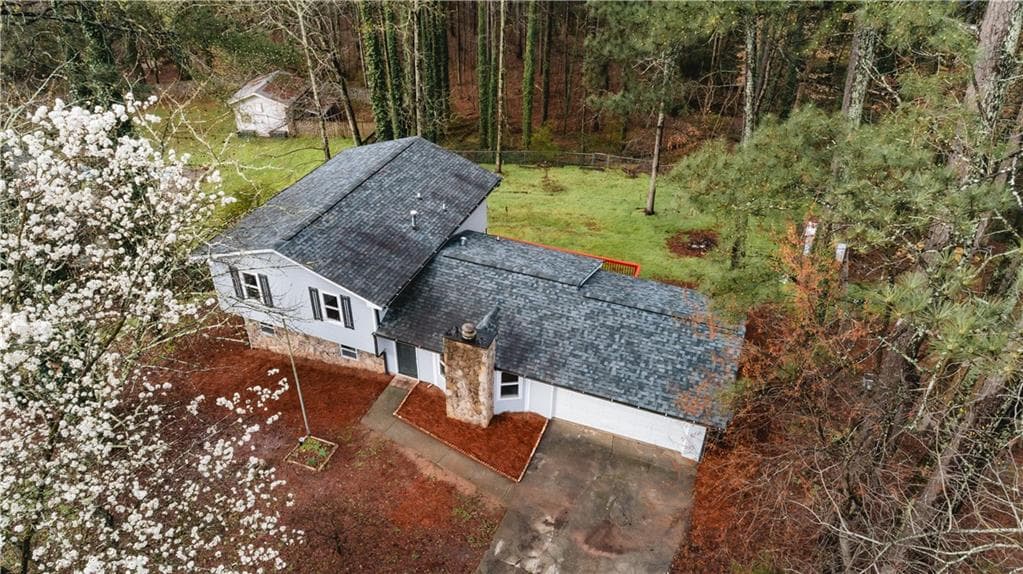 4 bedroom, 3 bathroom, 2,134 sq ft single family residence for sale at 3043 Fireside Drive, Snellville, GA 30078 — photo 2