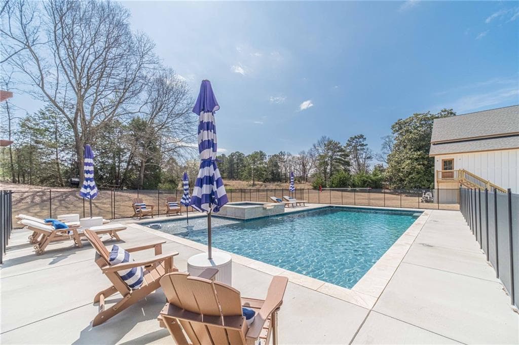 6 bedroom, 6 bathroom, 6,007 sq ft single family residence under contract at 1009 Easy Street, Winder, GA 30680 — photo 2