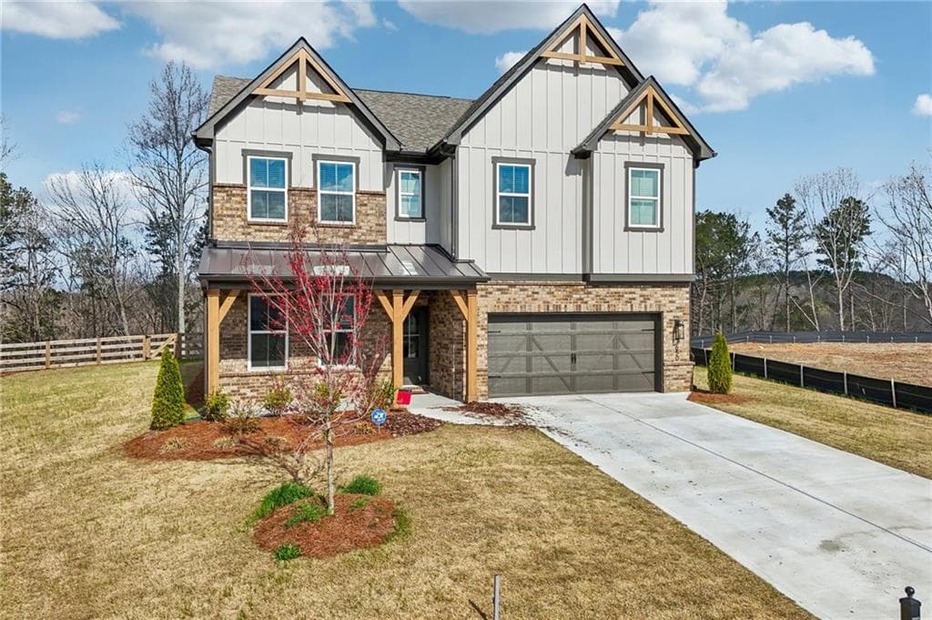 5 bedroom, 4 bathroom, 3,100 sq ft single family residence for sale at 7650 Homer Drive, Cumming, GA 30028 — photo 3