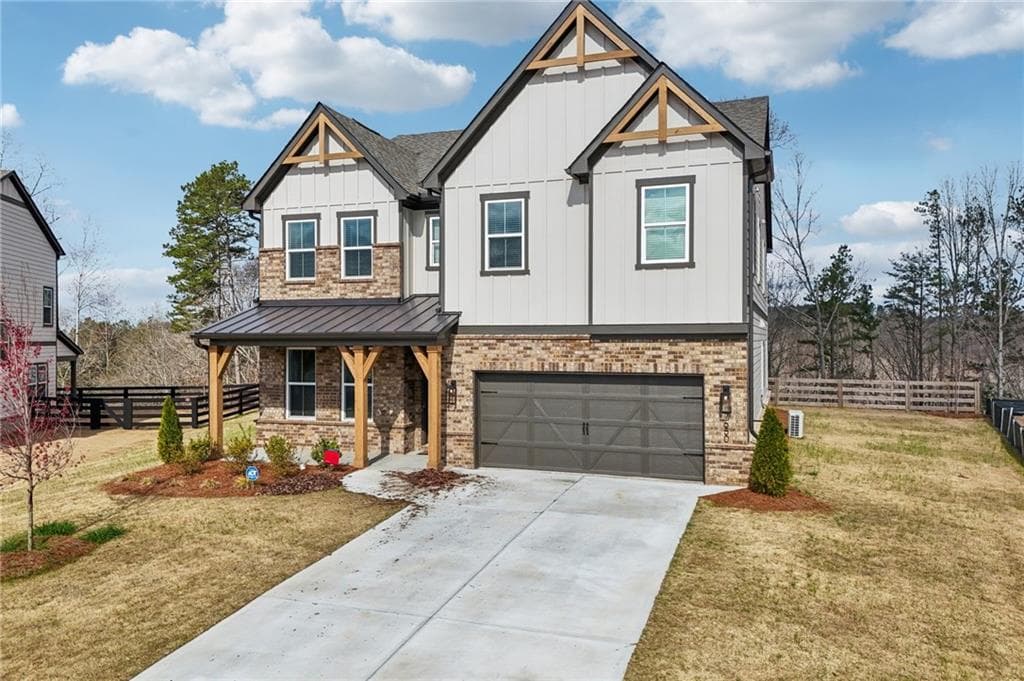 5 bedroom, 4 bathroom, 3,100 sq ft single family residence for sale at 7650 Homer Drive, Cumming, GA 30028 — photo 4