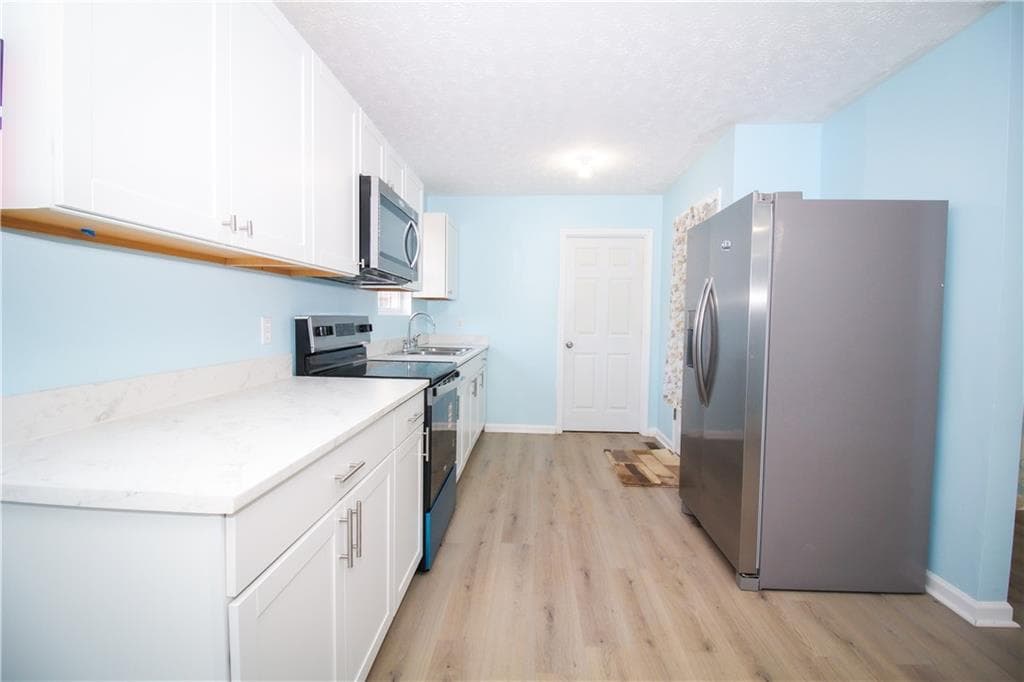 3 bedroom, 2 bathroom, 1,351 sq ft single family residence for sale at 5674 Maiden Lane, Lula, GA 30554 — photo 5