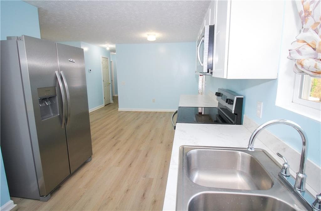 3 bedroom, 2 bathroom, 1,351 sq ft single family residence for sale at 5674 Maiden Lane, Lula, GA 30554 — photo 8