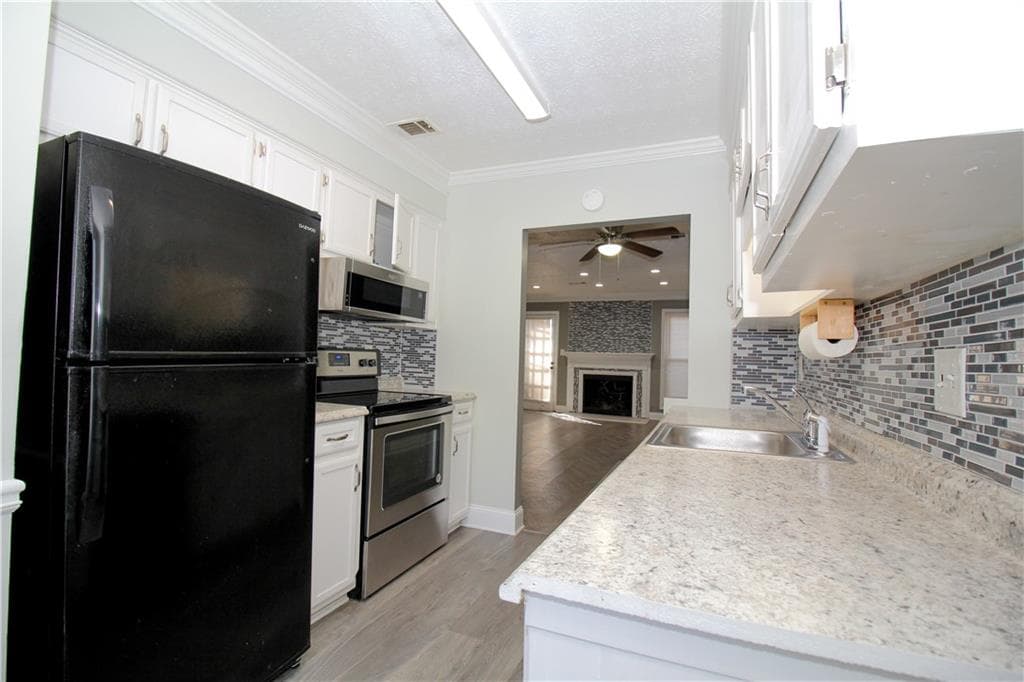 2 bedroom, 2 bathroom, 1,144 sq ft townhouse for sale at 2340 Beaver Ruin Road UN7, Norcross, GA 30071 — photo 4