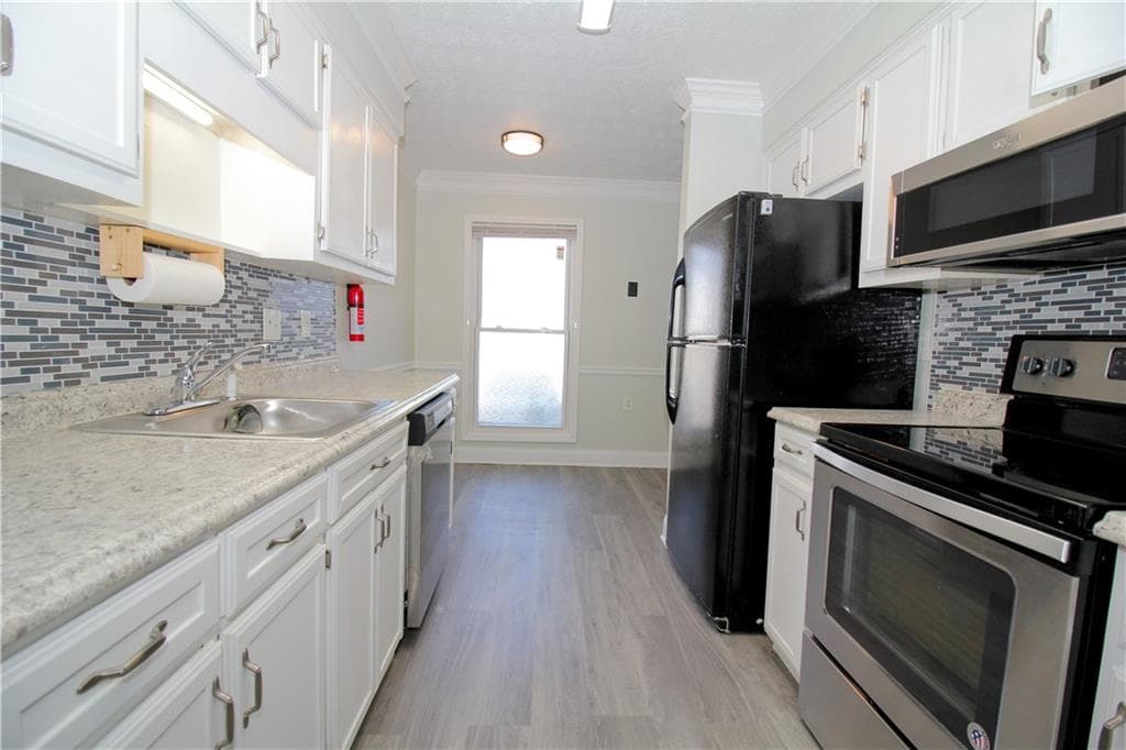 2 bedroom, 2 bathroom, 1,144 sq ft townhouse for sale at 2340 Beaver Ruin Road UN7, Norcross, GA 30071 — photo 5