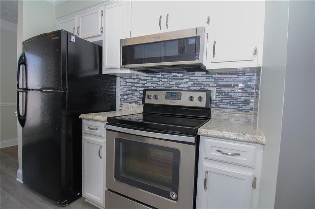 2 bedroom, 2 bathroom, 1,144 sq ft townhouse for sale at 2340 Beaver Ruin Road UN7, Norcross, GA 30071 — photo 6