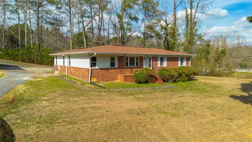 4 bedroom, 3 bathroom, 1,512 sq ft single family residence sold at 610 Oxbo Road, Roswell, GA 30075