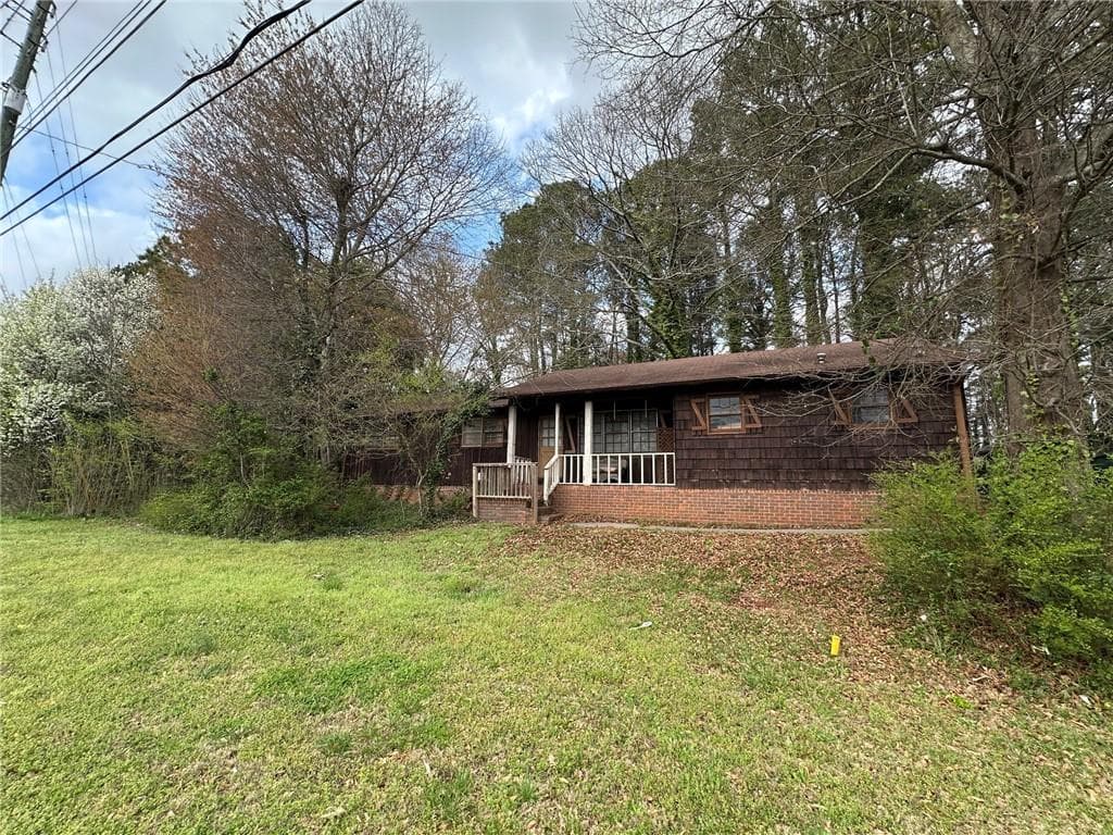 3 bedroom, 2 bathroom, 1,338 sq ft single family residence for sale at 7243 Highway 92 Road, Woodstock, GA 30189