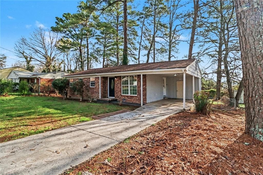 3 bedroom, 2 bathroom, 1,075 sq ft single family residence for sale at 6344 Westbury Road, Riverdale, GA 30274 — photo 2