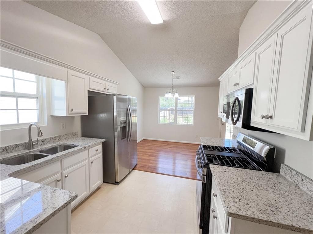 3 bedroom, 2 bathroom, 1,356 sq ft single family residence for sale at 124 Amelia Garden Way, Lawrenceville, GA 30045 — photo 2