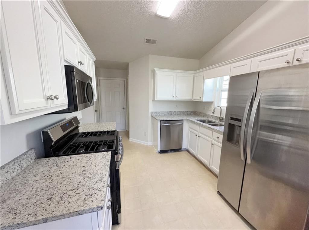 3 bedroom, 2 bathroom, 1,356 sq ft single family residence for sale at 124 Amelia Garden Way, Lawrenceville, GA 30045 — photo 8