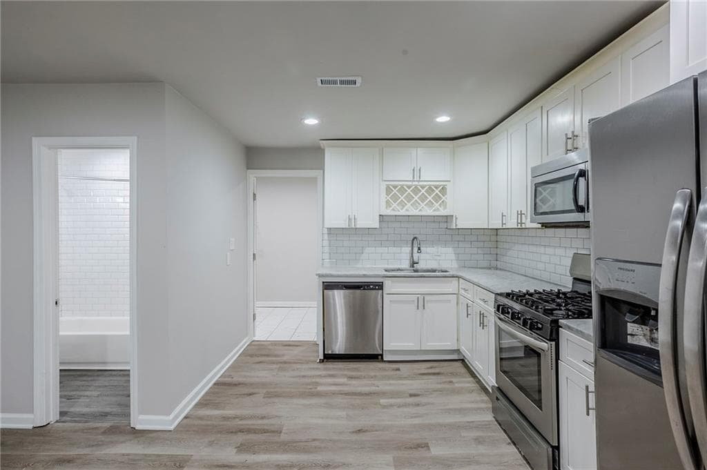 5 bedroom, 3 bathroom, 1,715 sq ft single family residence for sale at 3735 Boulder Park Drive, Atlanta, GA 30331 — photo 3