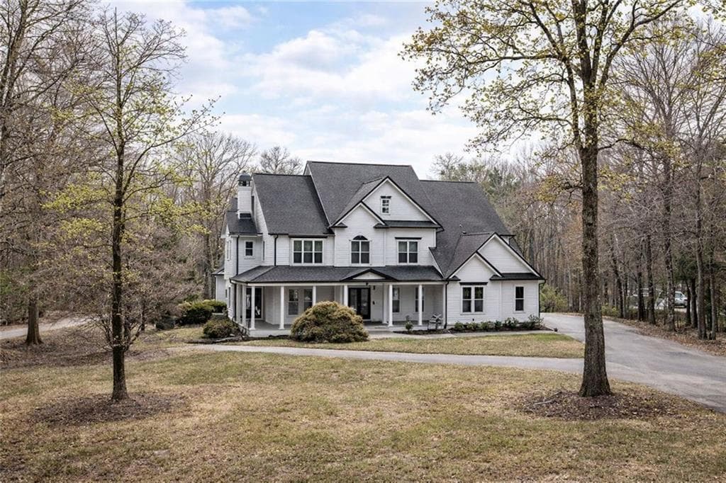 6 bedroom, 6 bathroom, 6,096 sq ft single family residence sold at 2719 Tribble Mill Road, Lawrenceville, GA 30045