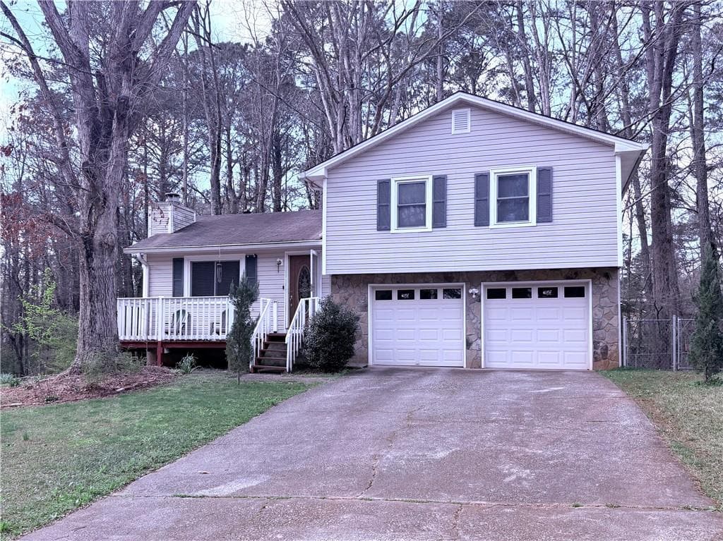 3 bedroom, 2 bathroom, 1,516 sq ft single family residence for sale at 4135 TANGLEWOOD RD, Snellville, GA 30039 — photo 1 of 24