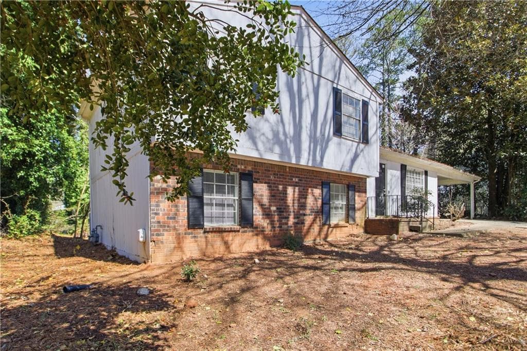 3 bedroom, 2 bathroom, 1,674 sq ft single family residence under contract at 8822 Ashwood Drive, Riverdale, GA 30274 — photo 2