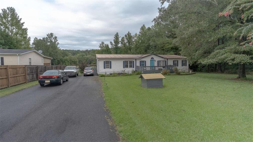 4 bedroom, 2 bathroom, 2,176 sq ft single family residence for sale at 1170 River Woods Drive, Madison, GA 30650 — photo 2