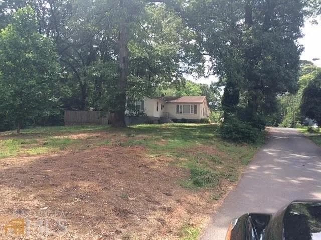 4 bedroom, 3 bathroom single family residence under contract at 4071 Church Street, Clarkston, GA 30021 — photo 2