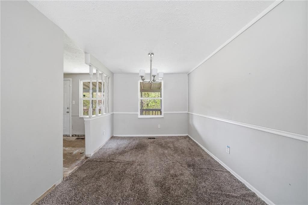 4 bedroom, 2 bathroom, 1,020 sq ft single family residence for sale at 6865 Kimberly Mill Road, Atlanta, GA 30349 — photo 3