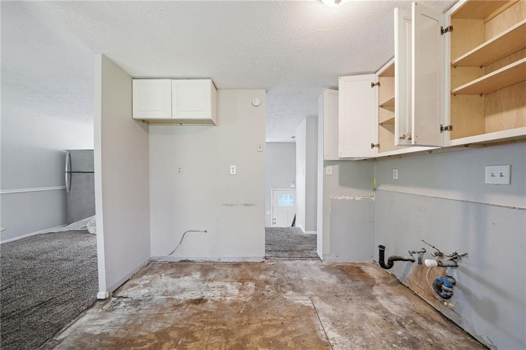 4 bedroom, 2 bathroom, 1,020 sq ft single family residence for sale at 6865 Kimberly Mill Road, Atlanta, GA 30349 — photo 5