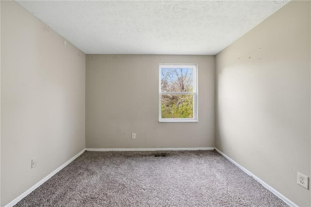 4 bedroom, 2 bathroom, 1,020 sq ft single family residence for sale at 6865 Kimberly Mill Road, Atlanta, GA 30349 — photo 10