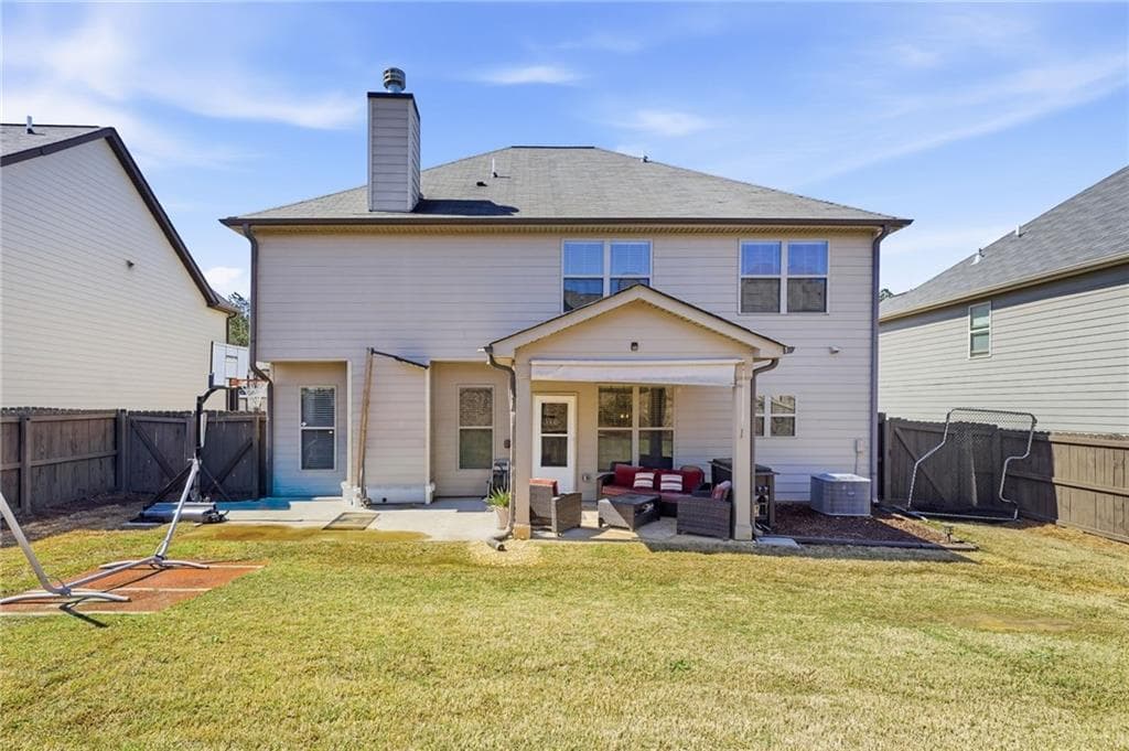 4 bedroom, 3 bathroom, 2,564 sq ft single family residence for sale at 1112 Deadwood Trail, Loganville, GA 30052 — photo 3