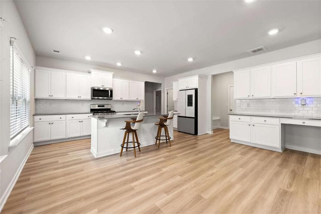 5 bedroom, 3 bathroom, 3,080 sq ft single family residence for sale at 227 Eleanora Way, Loganville, GA 30052 — photo 8