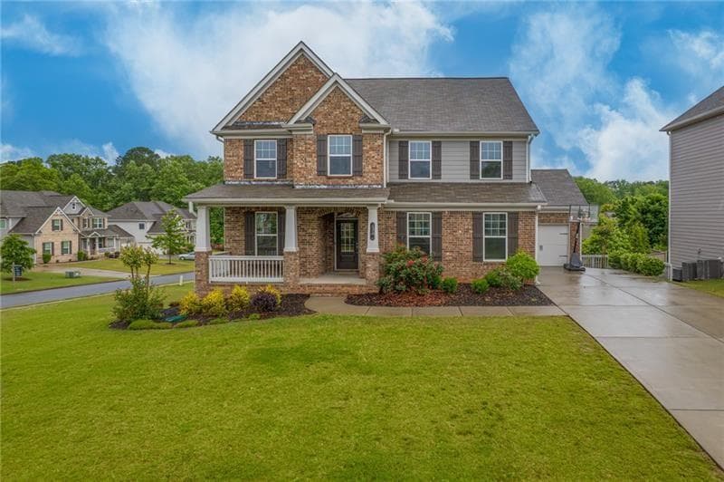 5 bedroom, 4 bathroom, 5,132 sq ft single family residence for sale at 301 Cochin Drive, Woodstock, GA 30188 — photo 2