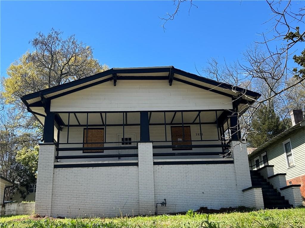 4 bedroom, 4 bathroom, 1,392 sq ft single family residence for sale at 1831 Jonesboro Road, Atlanta, GA 30315 — photo 1 of 19