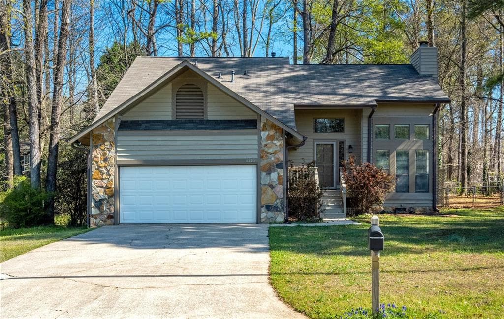 3 bedroom, 2 bathroom, 1,765 sq ft single family residence for sale at 1131 Bailing Drive, Lawrenceville, GA 30043 — photo 1 of 28