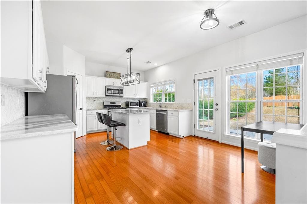 5 bedroom, 3 bathroom, 2,573 sq ft single family residence for sale at 243 Wedmore Court, Suwanee, GA 30024 — photo 10