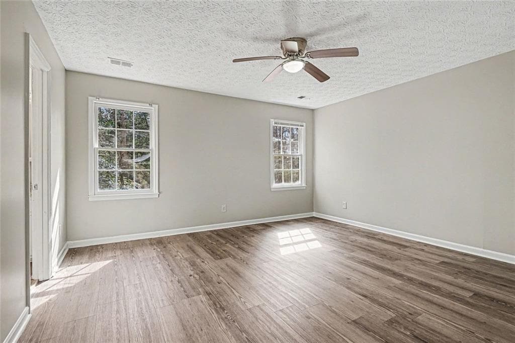 3 bedroom, 2 bathroom, 1,556 sq ft single family residence for sale at 2060 Lost Forest Lane, Conyers, GA 30094 — photo 9