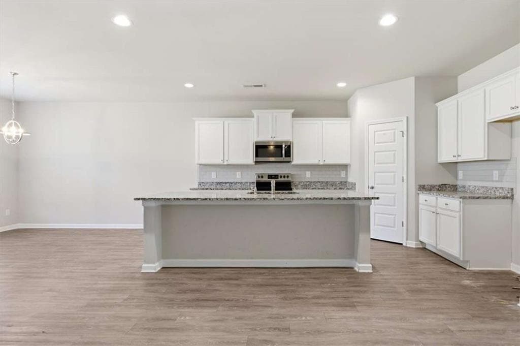 4 bedroom, 3 bathroom, 2,082 sq ft single family residence under contract at 1332 Slaton Manor Drive, Conyers, GA 30012 — photo 8