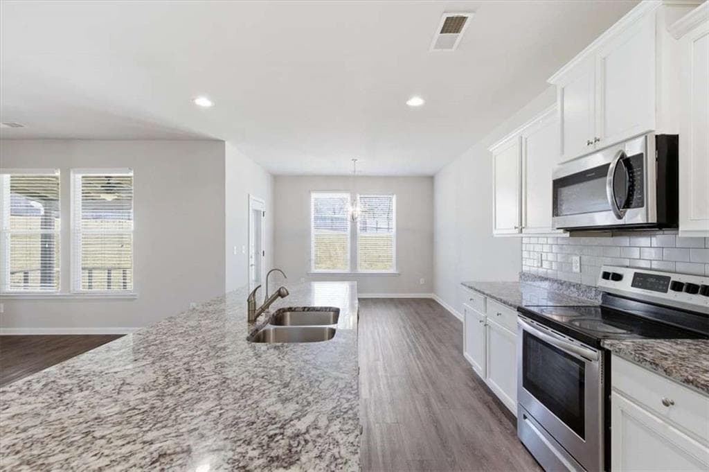 4 bedroom, 3 bathroom, 2,082 sq ft single family residence under contract at 1332 Slaton Manor Drive, Conyers, GA 30012 — photo 10