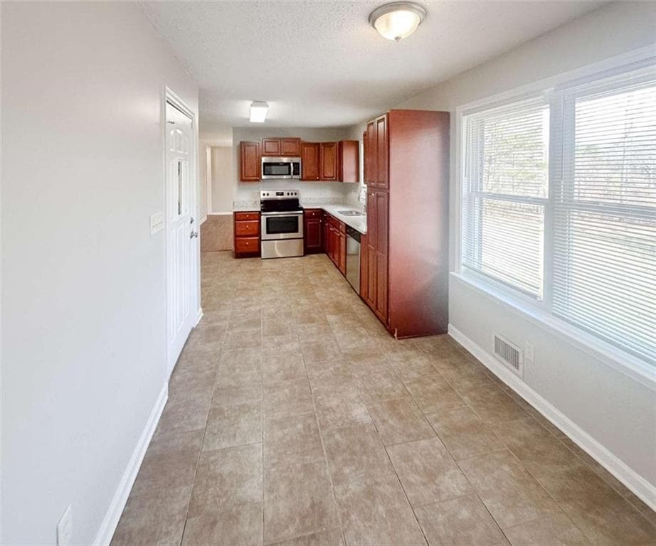 4 bedroom, 3 bathroom, 2,058 sq ft single family residence for sale at 4060 W Stubbs Road, South Fulton, GA 30349 — photo 9