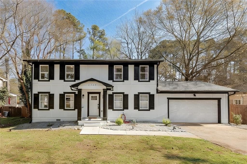 4 bedroom, 3 bathroom, 2,080 sq ft single family residence for sale at 2328 Carnes Road, Jonesboro, GA 30236