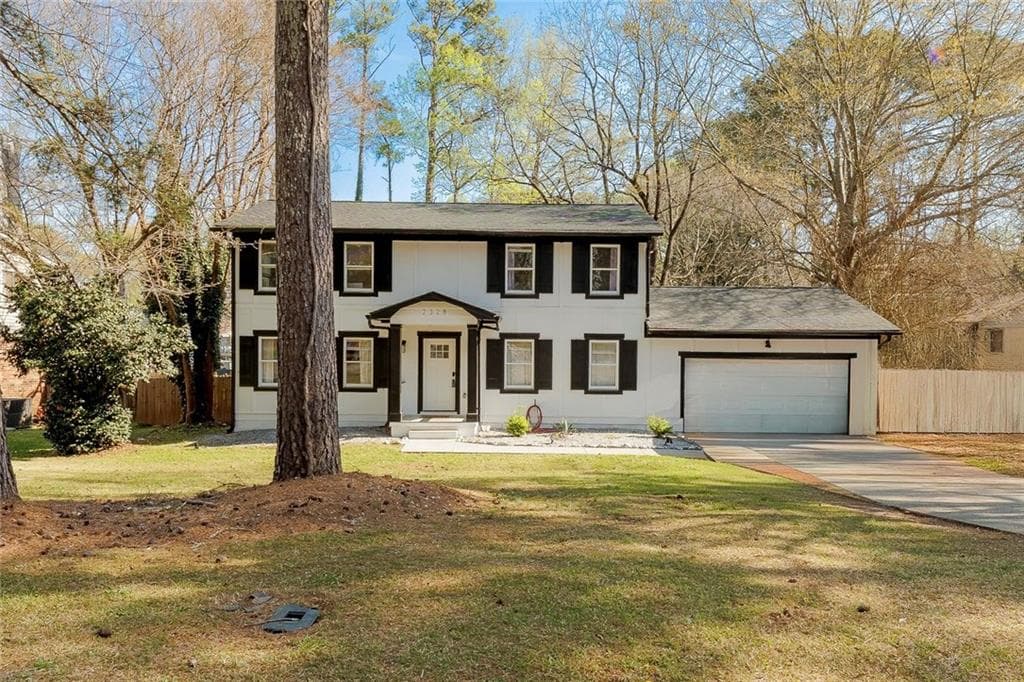 4 bedroom, 3 bathroom, 2,080 sq ft single family residence for sale at 2328 Carnes Road, Jonesboro, GA 30236 — photo 3