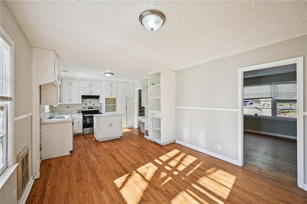 4 bedroom, 2 bathroom, 1,969 sq ft single family residence for sale at 1324 N Hicks Circle, Conyers, GA 30012 — photo 9