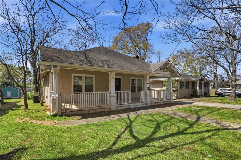 3 bedroom, 1 bathroom, 1,920 sq ft single family residence for sale at 1691 Evans Drive, Atlanta, GA 30310 — photo 1 of 34