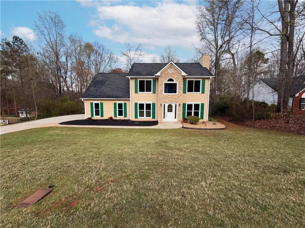 4 bedroom, 3 bathroom, 2,234 sq ft single family residence for sale at 1965 Deer Creek Trail, Buford, GA 30519 — photo 1 of 28