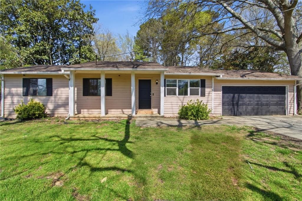 3 bedroom, 2 bathroom, 1,424 sq ft single family residence for sale at 4289 Rex Road, Rex, GA 30273 — photo 2