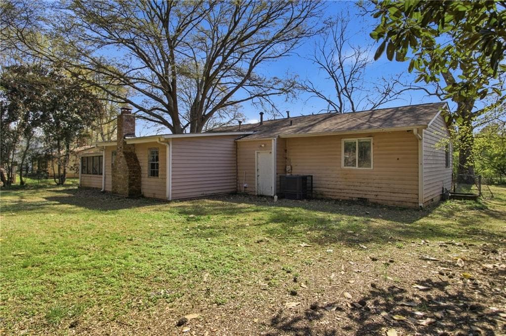 3 bedroom, 2 bathroom, 1,424 sq ft single family residence for sale at 4289 Rex Road, Rex, GA 30273 — photo 4