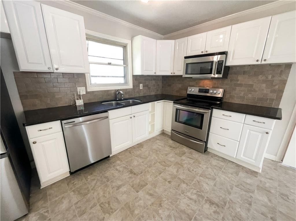 3 bedroom, 2 bathroom, 1,224 sq ft single family residence for sale at 2855 Jerome Road, Atlanta, GA 30349 — photo 6